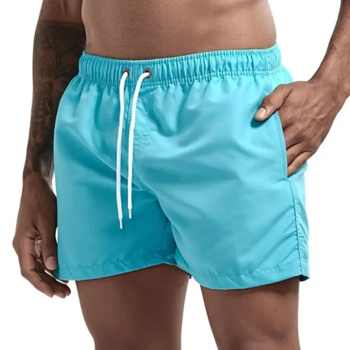 Shorts de natación para hombre de secado rápido con cinturón ajustable y bolsillos para surf y playa, estilo casual y transpirable. - 1