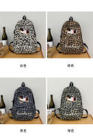 Bolsa de la escuela ins viento Japón y Corea campus estampado de leopardo de dibujos animados masculino y femenino estudiantes mochila de escuela media estudiante bolsa de la escuela bolsa de ordenador mochila de gran capacidad - details 2