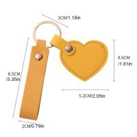 LLavero con forma de corazón de PU, bolso de Color sólido, llavero de cuero con forma de corazón, accesorio colgante, decoración para mochila, colgante colorido - details 0