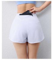 Pantalones cortos de yoga con bolsillos para deportes activos con cintura elástica y capa para correr de secado rápido para mujer - details 6