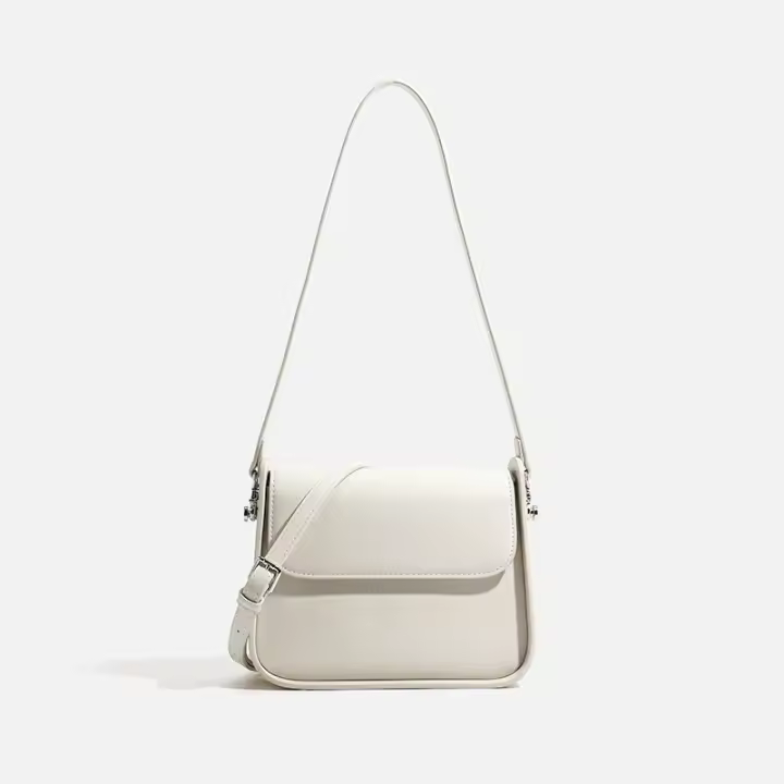 Bolsos de tofu para mujer, bolsos retro de alta gama para las axilas, nuevas bolsas de sillín, bolsos de hombro para viajeras, bolsos cuadrados pequeños cruzados. - 1