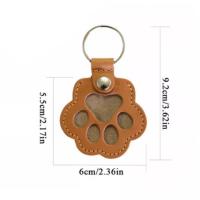 Llavero divertido y bonito con garra de gato, bolsa de almacenamiento de pelo de mascota creativa, llavero de cuero PU, colgante de pata de perro, bolsa colgante - details 0