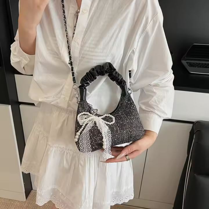 Bolso plisado de lentejuelas de estilo coreano, bolso cruzado con cadena y colgante de lazo exquisito, bolso de hombro ligero de Color sólido - 1