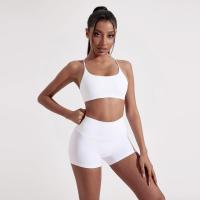 Ropa interior de yoga para gimnasio de color sólido, sujetador de fitness con correas cruzadas en la espalda, top deportivo ajustado de alta resistencia, completo con almohadilla para el pecho - details 3