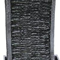 soothing sound of water flows down the tall fountain