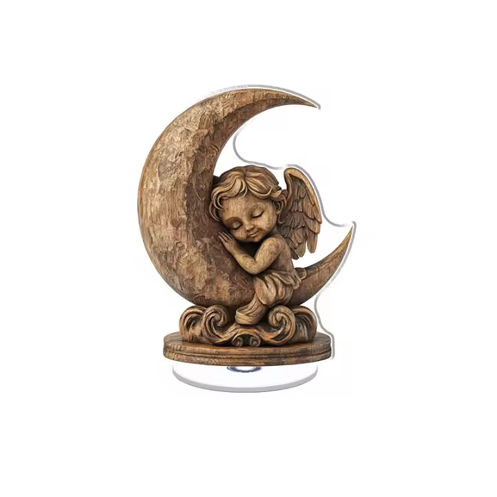Adorno acrílico giratorio con una luna de madera, un ángel de madera y una base de madera tallada, elegantemente exhibido sobre un fondo blanco - 1