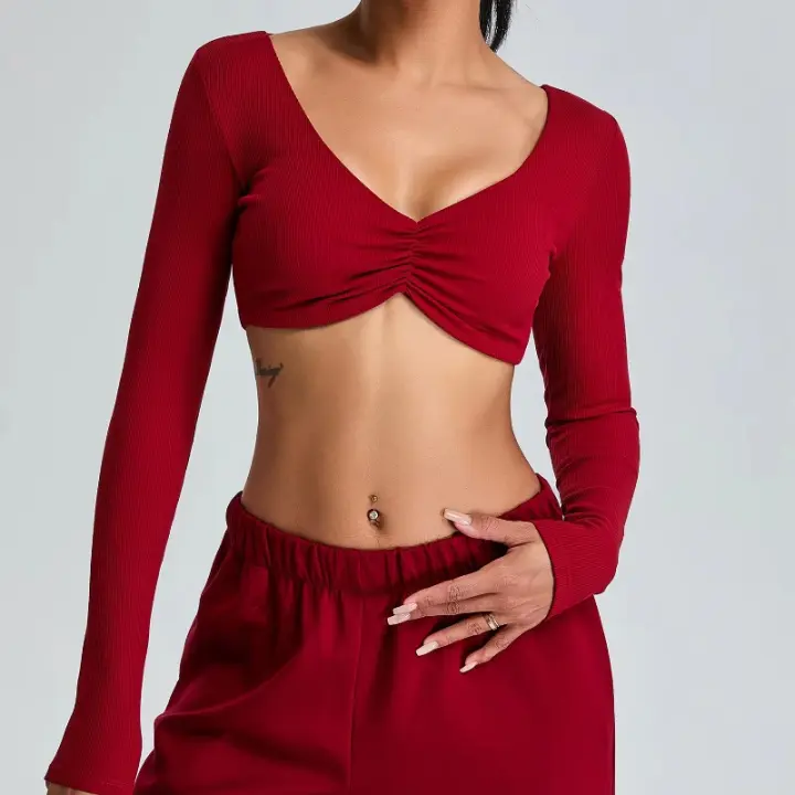 Camiseta deportiva plisada de manga larga con cuello en V profundo para mujer al por mayor - 1