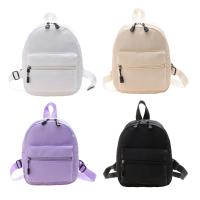 Mini mochila escolar de nailon para niñas, morral pequeño de viaje, impermeable, informal, sólido - details 0