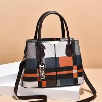 Bolso de mano a cuadros atmosférico para mujer, bandolera informal de gran capacidad, bandolera de mediana edad, mochila de lujo de alta gama - details 0