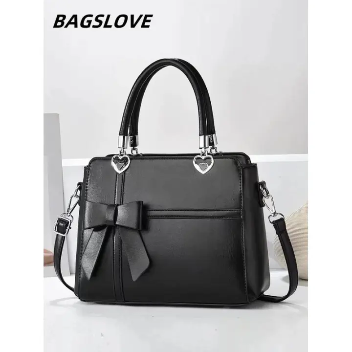 Bolso de moda con decoración de lazo de color sólido para desplazamientos, esencial para las mamás que salen, bolso minimalista de gran capacidad Mochila de lujo de alta gama - 1