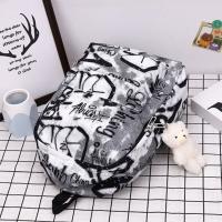Mochila escolar de gran capacidad con grafiti para estudiantes, mochila informal de moda para mujer, mochila escolar con colgante de dibujos animados para niña que se desplaza - details 10