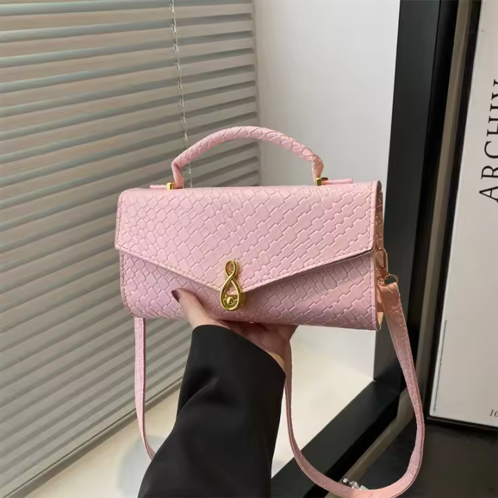 2025 Primavera y verano color sólido nuevo tejido superficie suave elegante textura de gran capacidad bolso de mano horizontal para las axilas para mujeres - 1