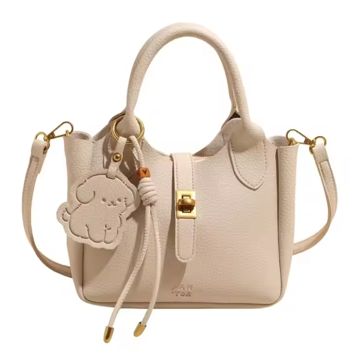 Bolso de mano de lujo para mujer, estilo casual chic, con diseño de lichi, bandolera de piel sintética, colgante de cachorro, para uso diario. - 1