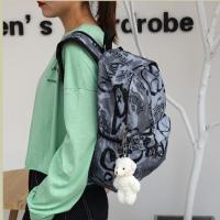 Mochila escolar de gran capacidad con grafiti para estudiantes, mochila informal de moda para mujer, mochila escolar con colgante de dibujos animados para niña que se desplaza - details 9