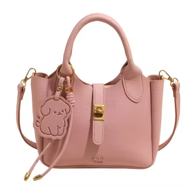 Bolso de mano elegante con forma de cubo cruzado inclinado, bolso de mano con colgante de cachorro para mujer, bolso de hombro de cuero de PU de alta gama con patrón de lichi, primavera y verano - 1