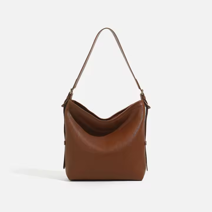 Bolso de mano de gran capacidad, suave y liso, tipo cubo de viento perezoso para mujer, nuevo bolso de mensajero de un solo hombro. - 1