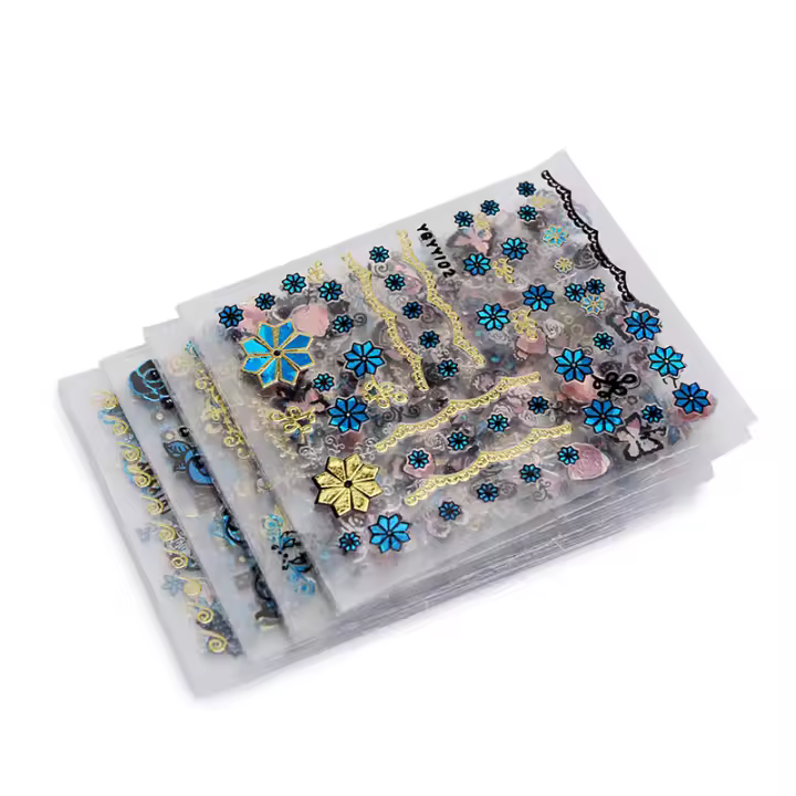 Pegatinas de Arte de Uñas 3D con Diseño Hueco de Folio Dorado Azul 30Pcs Decoración de Uñas Adhesiva con Flores - 1