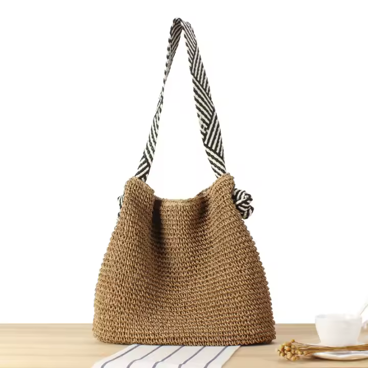 2025 nueva mujer estilo marino versátil cuerda de papel bolsa tejida correa de hombro anudada nicho de vacaciones bolsa tejida bolsa de playa - 1