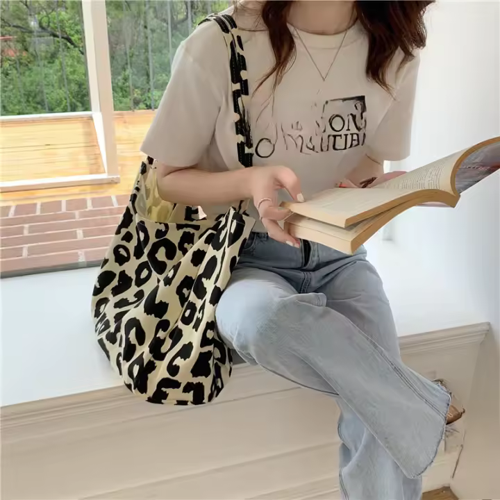 Bolso de hombro de lona con estampado animal de gran capacidad con estampado de leopardo de arroz para niña. - 1
