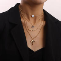 Collar con colgante de nariz de elefante y ojo de demonio azul, cadena fina multicapa a la moda para mujer - details 1