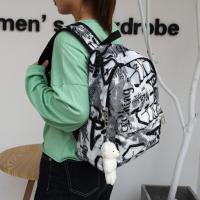 Mochila escolar de gran capacidad con grafiti para estudiantes, mochila informal de moda para mujer, mochila escolar con colgante de dibujos animados para niña que se desplaza - details 3