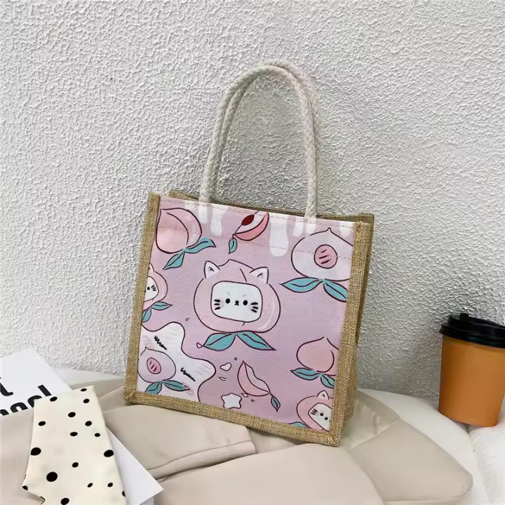 Pequeña bolsa de lino de gran capacidad fresca 2025 nueva bolsa de mano simple estudiante de dibujos animados bolsa de lona - 1