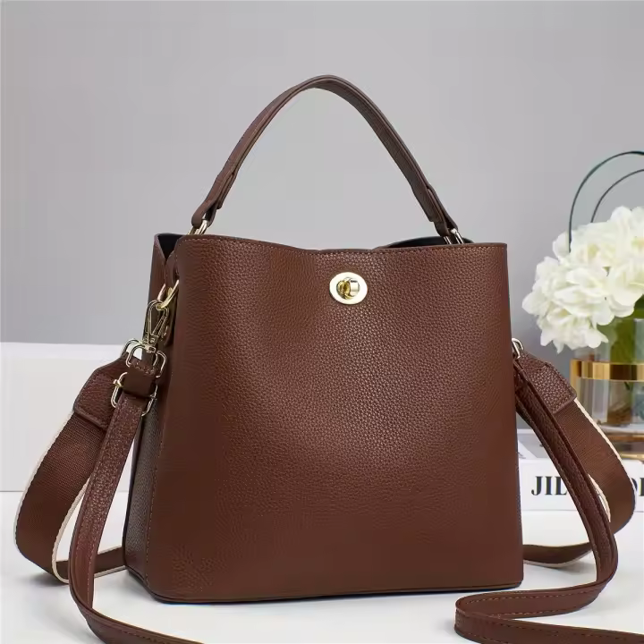 Bolso convertible de gran capacidad para mujer: PVC duradero con cierre giratorio en tono dorado, correas ajustables y desmontables - 1