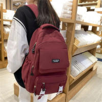 Mochila de gran capacidad de color puro, impermeable, multifuncional, bolso escolar para estudiantes, mochila de nylon para adol - details 8