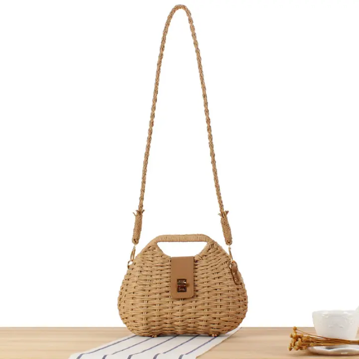 Bolso tejido de hierba de estilo occidental único, bolso cruzado versátil para vacaciones en la playa, nuevo - 1