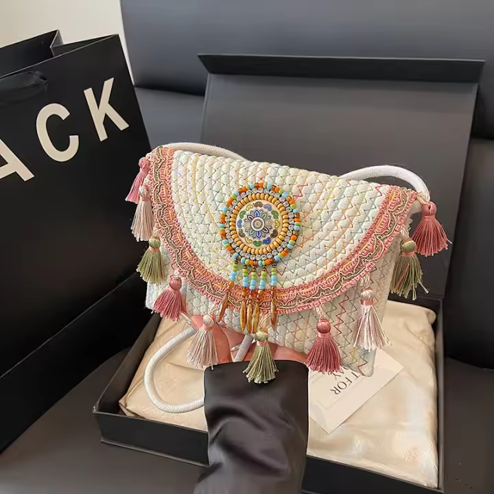 Bolso tejido a mano de verano estilo étnico de paja 2025 moda de interés especial nueva bandolera de hombro para vacaciones en la playa - 1
